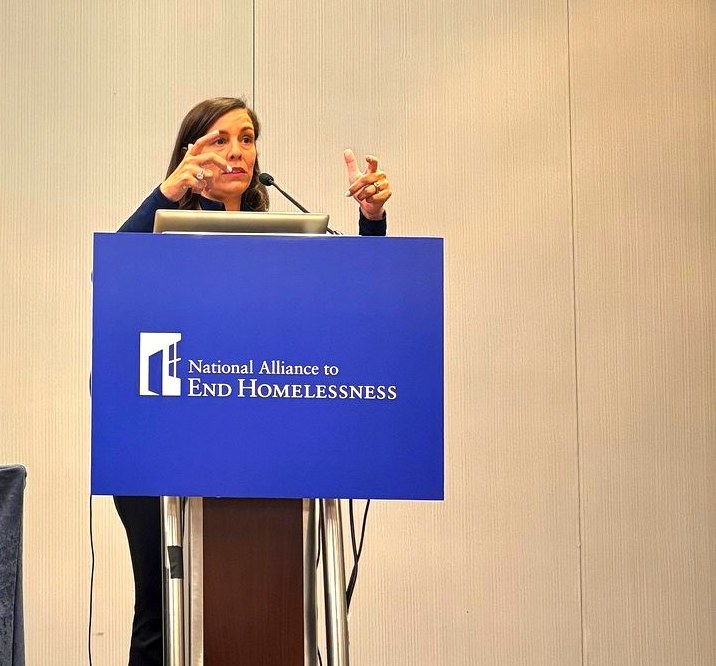 Dr. Isa Karabed at the National Alliance to End Homelessness podium