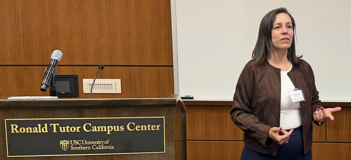 Dr. Isa Karabed presenting at the University of Southern California's Ronald Tutor Campus Center